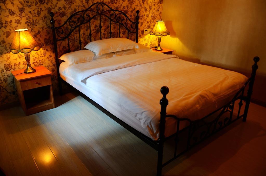 Snail Youth Hostel Huzhou Ruang foto