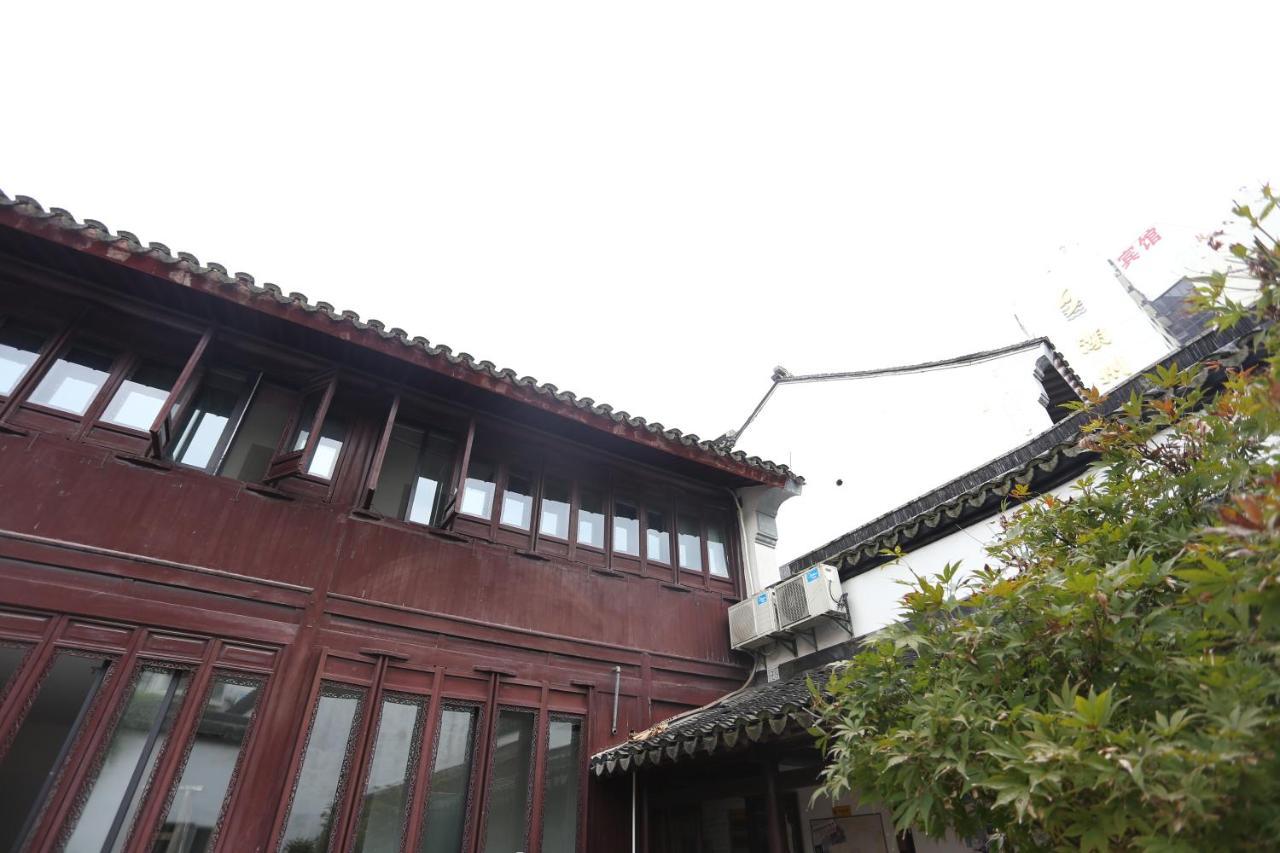 Snail Youth Hostel Huzhou Bagian luar foto