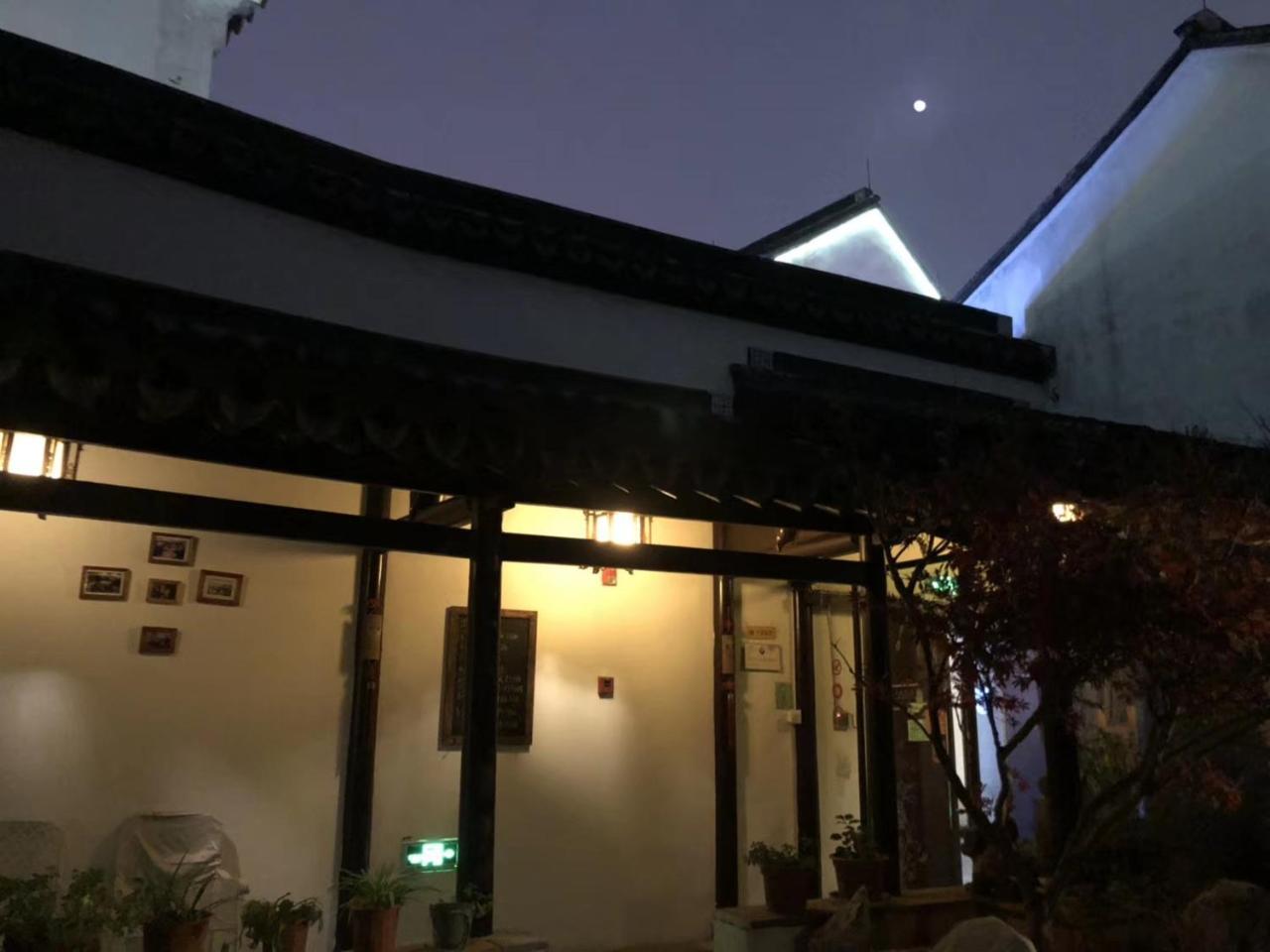Snail Youth Hostel Huzhou Bagian luar foto